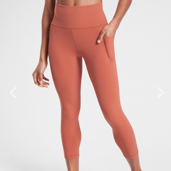 Athleta Pants - Athleta Salutation Stash Pocket Crop Tights orange